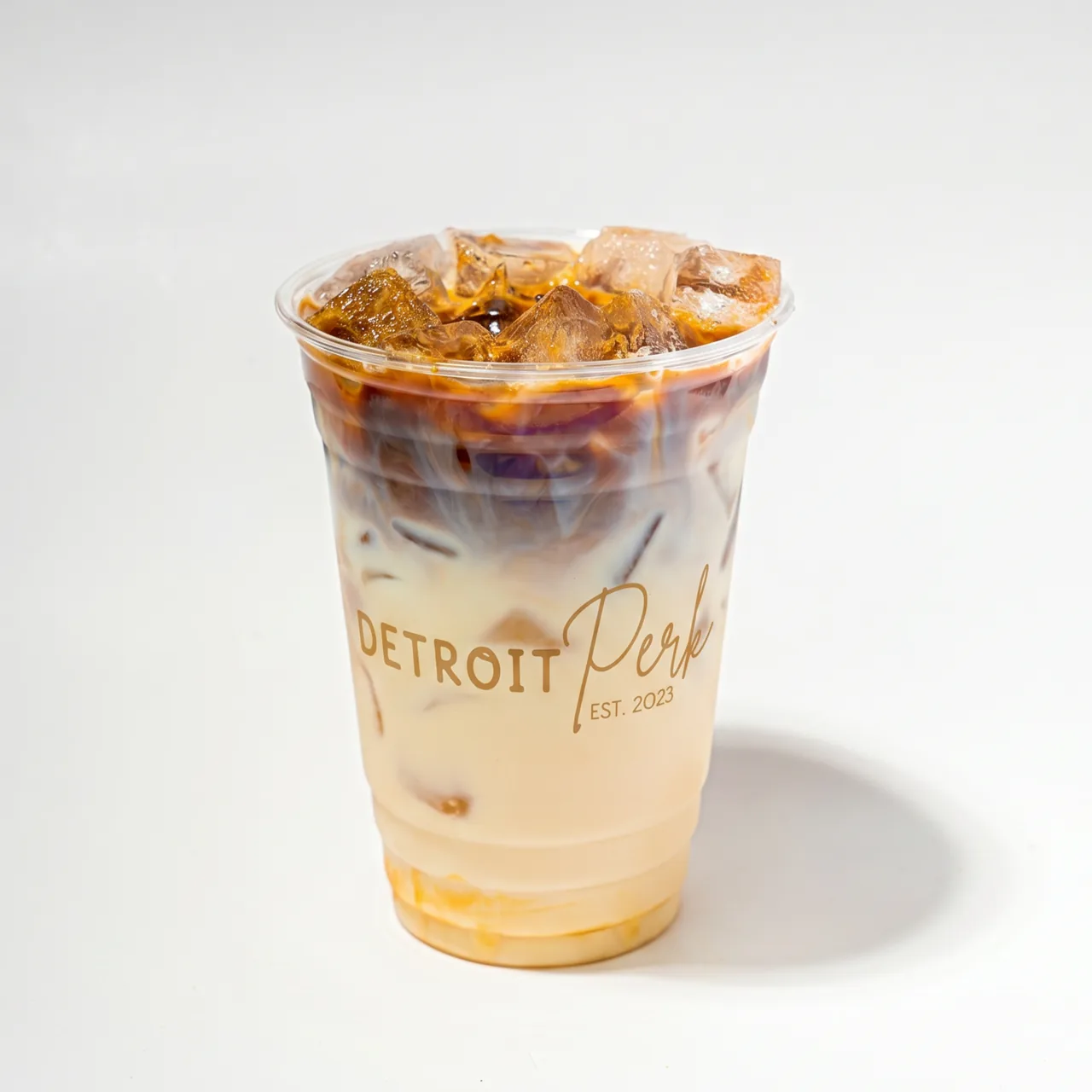 Iced latte in a Detroit Perk cup